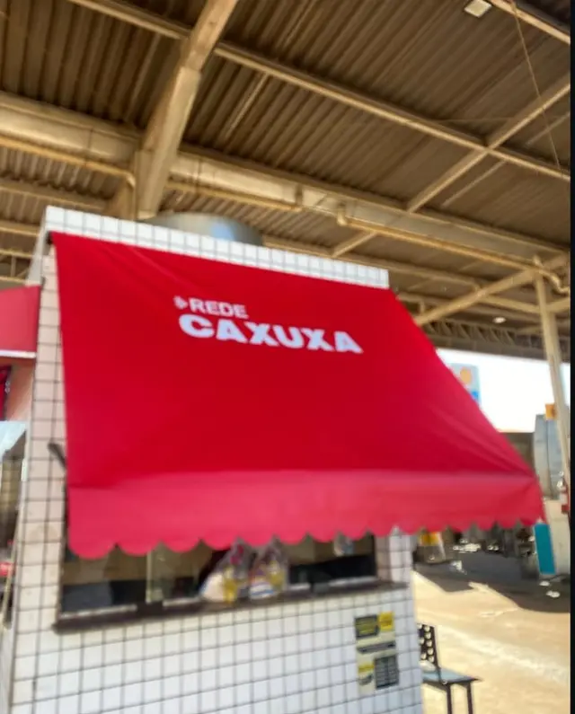 Rede Caxuxa — Toldo com identificação comercial